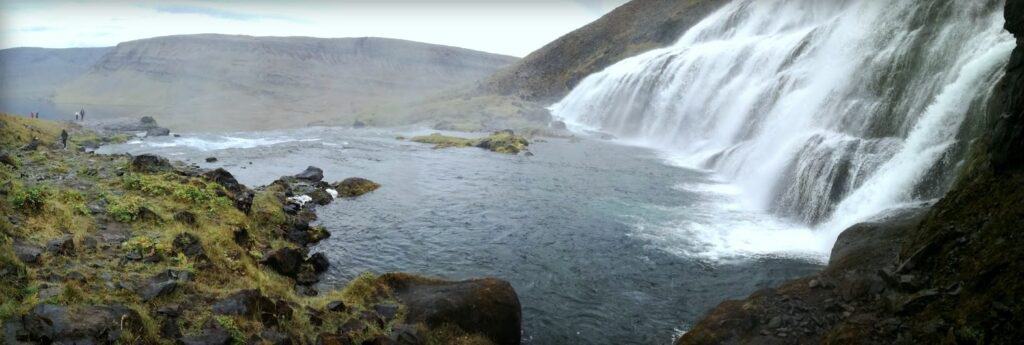 Waterfall, lake mountain and rocks
