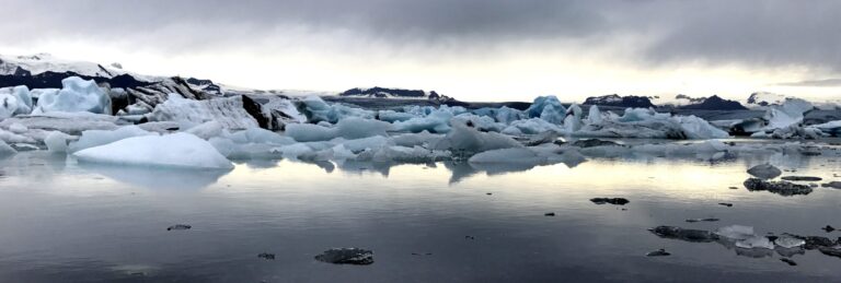 glacier lagoon filled with icebergs