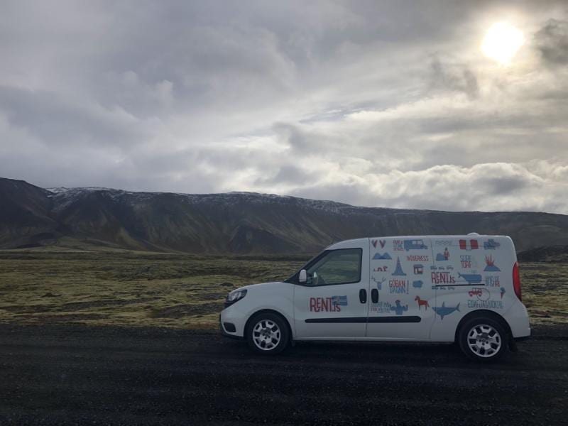 rentdev.vinnugrunnur.is campervan drving , mountains, gravel road, traveling in Iceland