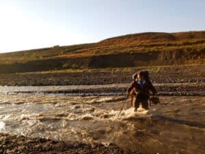 River crossing while hiking in Iceland