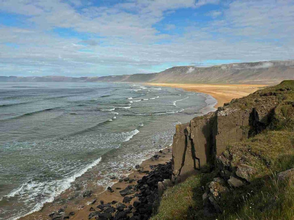 "An SUV Adventure" A golden beach by the ocean