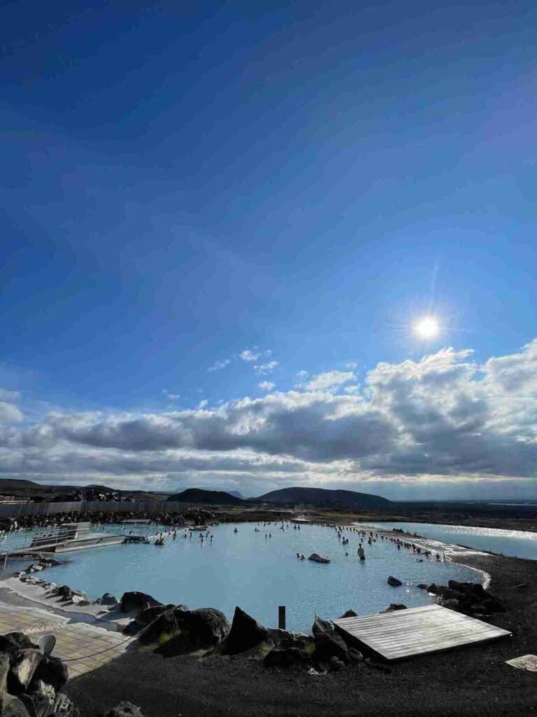 Looking out at the nature baths of Mývatn. Blue water and blue sky