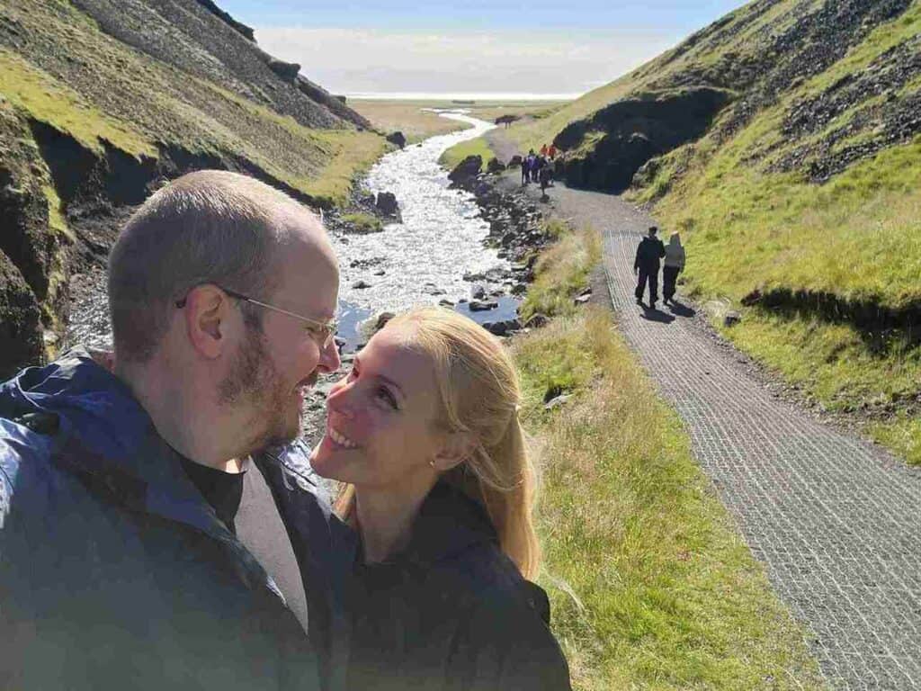 A couple looking each other in the eyes. 