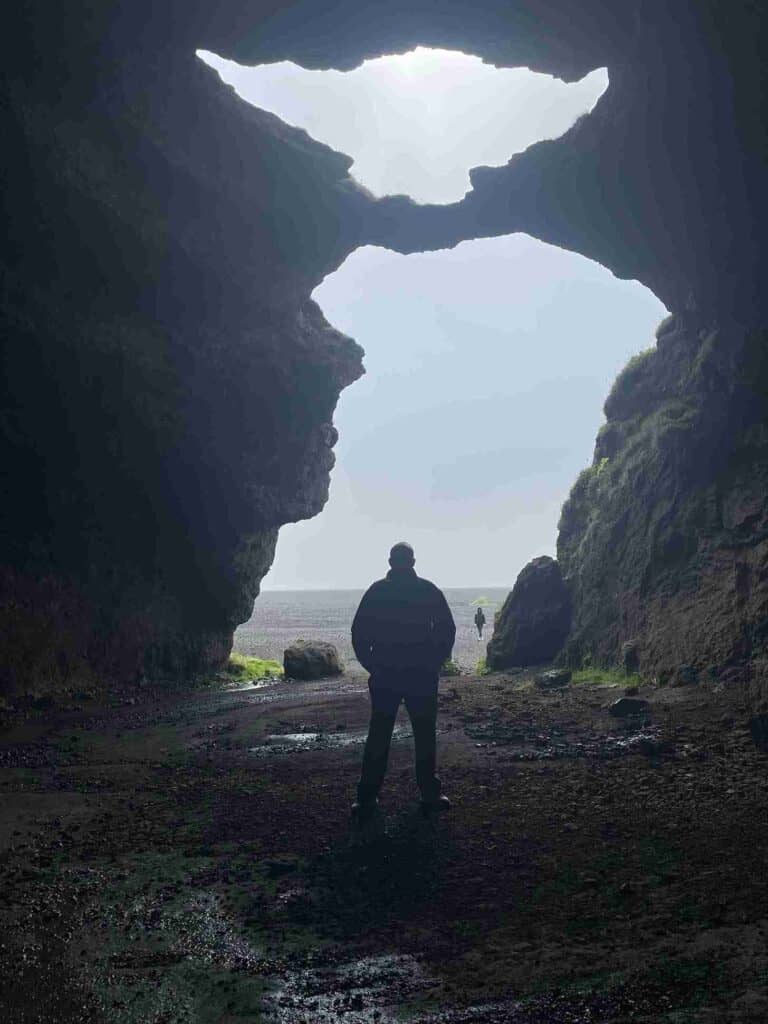 A man standing in a cave