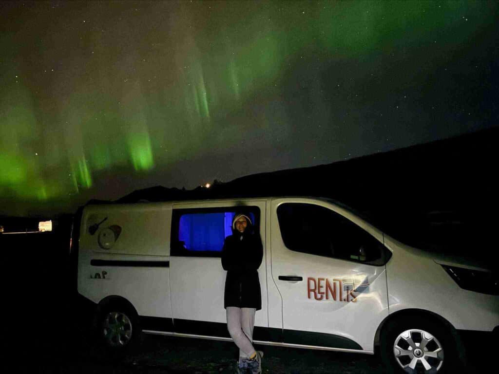 Trafic 3 parked by beautiful northern lights
